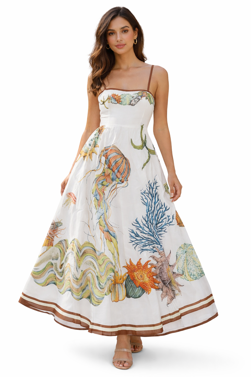 woman wearing a strapless dress with colorful ocean-themed print on a white background

Details